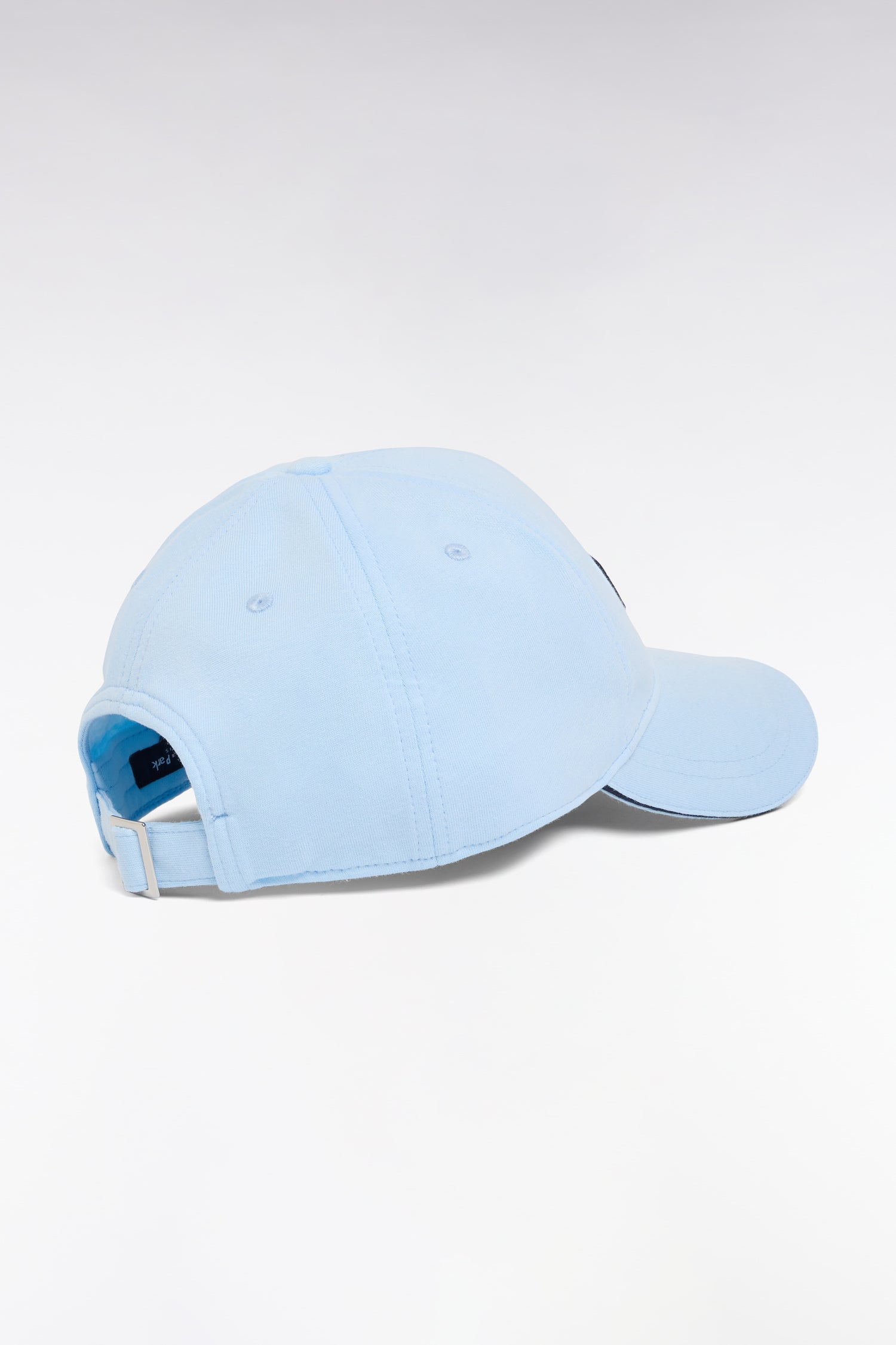 Casquette en coton ciel broderie nœud papillon rose EDEN PARK